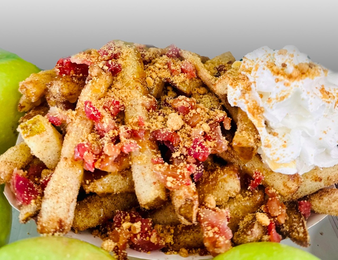 Bacon, Caramel, Peanut Butter Apple Fries
Apple fries topped with crispy bacon, Ghirardelli caramel and peanut butter powder. Fairgoers have the option of adding ice cream.
Location: Apple Fries