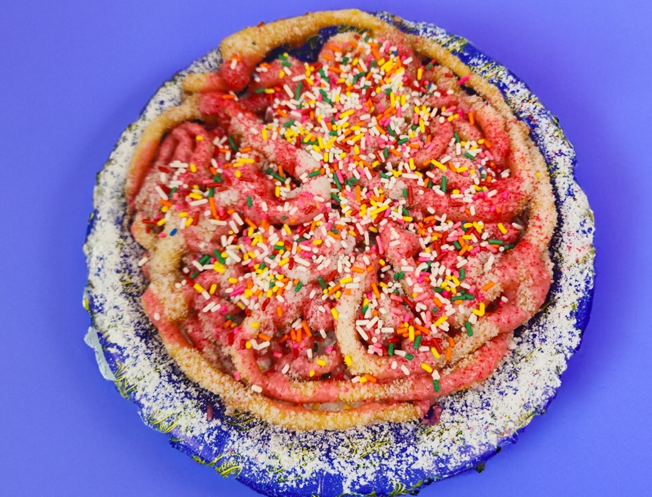 Barbie Funnel Cake
Funnel Cake with Powdered Sugar, Barbie Pink Icing and 2 kinds of Sprinkles.
Location: Paulette's Food Service
