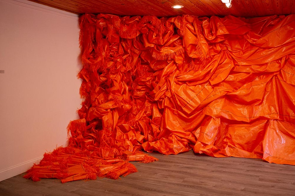 ‘Silt Fencing Room,’ site-specific installation with orange silt fencing, dimensions variable, 2022