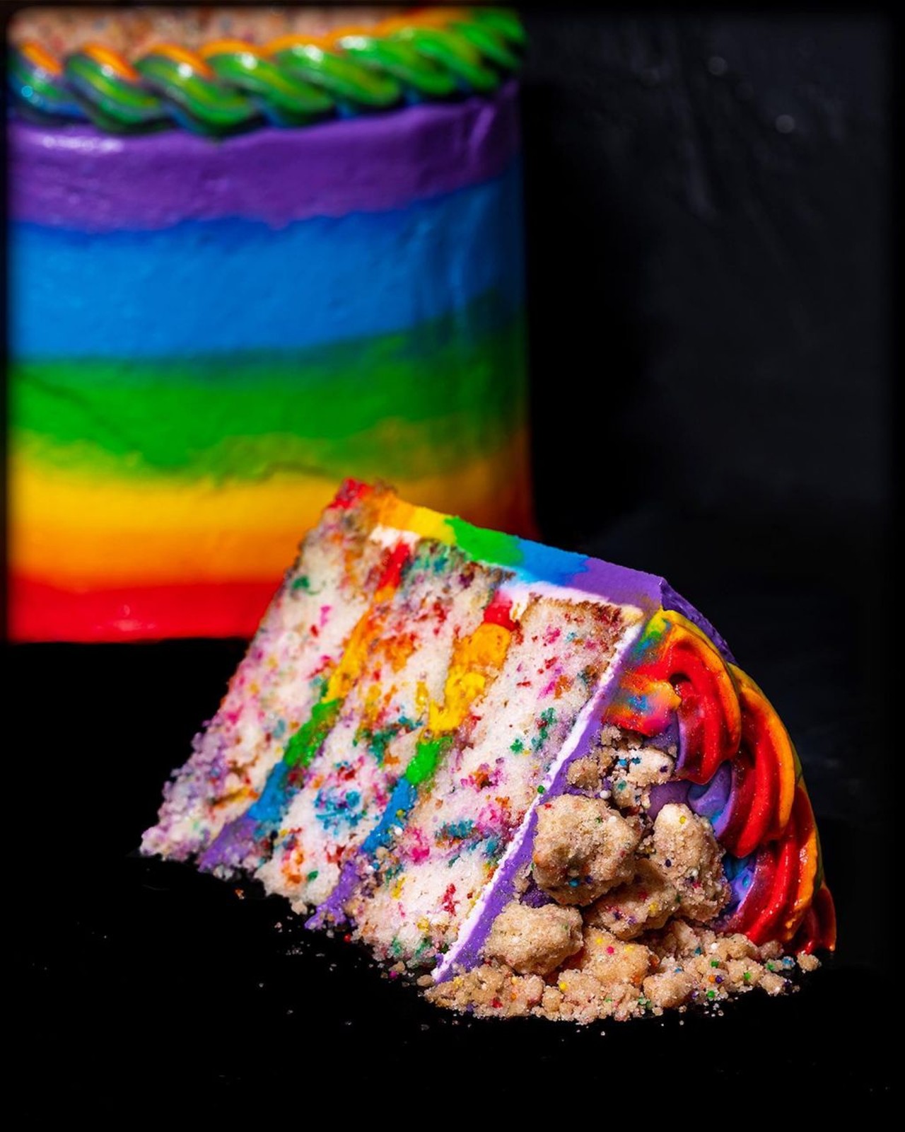 Gideon&#146;s Bakehouse 
1600 Buena Vista Dr, Lake Buena Vista, FL 32830, 3201 Corrine Dr, Orlando, FL 32803
Gideon is celebrating Pride Month with a delicious Rainbow Crunch cake. This cake is a 3-layer vanilla confetti cake covered with multi-colored marshmallow buttercream and laced with rainbow crumbs. It is first come, first served and available until supply lasts. 
Photo via Gideon&#146;s Bakehouse/Facebook