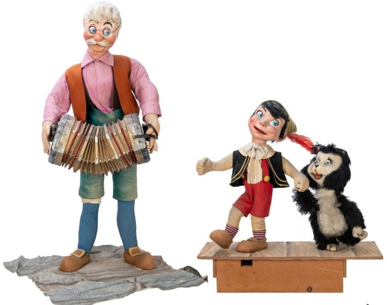Pinocchio, Geppetto, and Figaro automatonsEstimated Sale Price: $10-20,000 
These are estimated at $10,000-20,000. These figures recreate the scene from Disney&#146;s 1940 film when Pinocchio, Geppetto, and Figaro celebrate Pinocchio becoming a real boy.