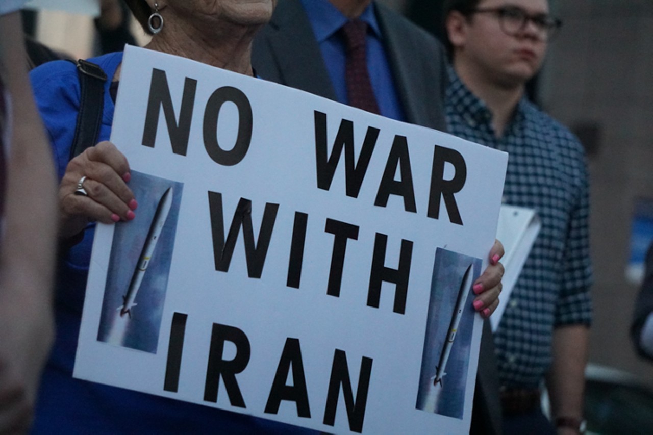 Everyone we saw and all the best signs from Orlando's 'No War with Iran' protest