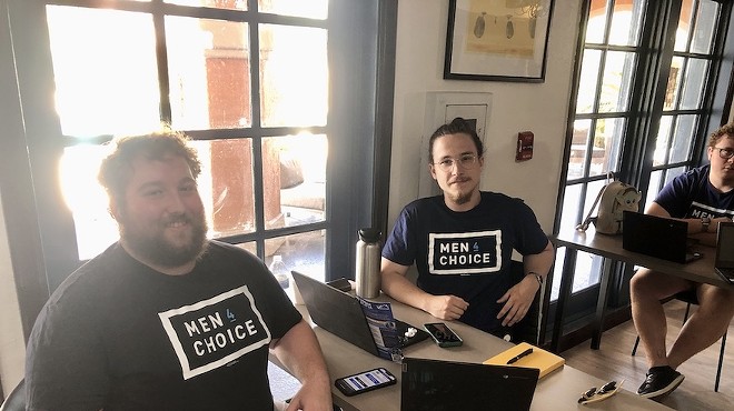 Florida men make calls for Florida's Amendment 4 as part of a joint effort by Mi Vecino and Men 4 Choice to get out the vote.