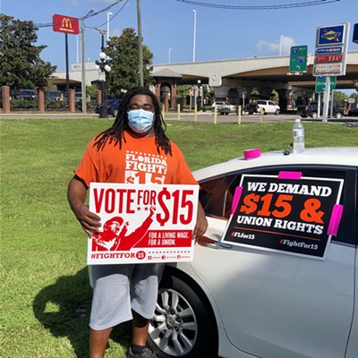 Florida workers organized with Fight for $15 rallies in support of a $15 minimum wage outside a McDonald's in Tampa, Florida in August 2020.