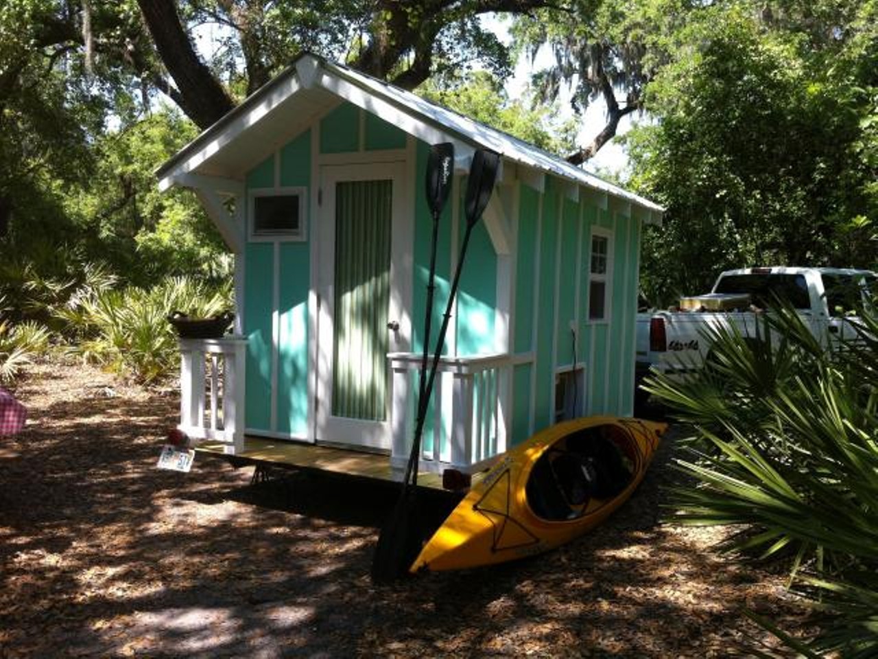 Aqua Tiny House
Location: Eustis
Price: $15000
Size: 70 sq ft
Look at the banister on the front porch!