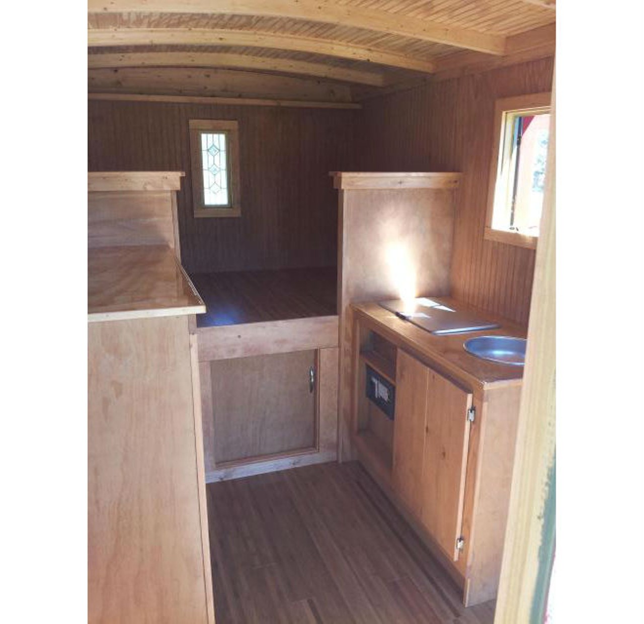 Gypsy Wagon Camper
Location: Clearwater
Price: $9250
Size: 90 sq ft 
Those windows are pretty cool.