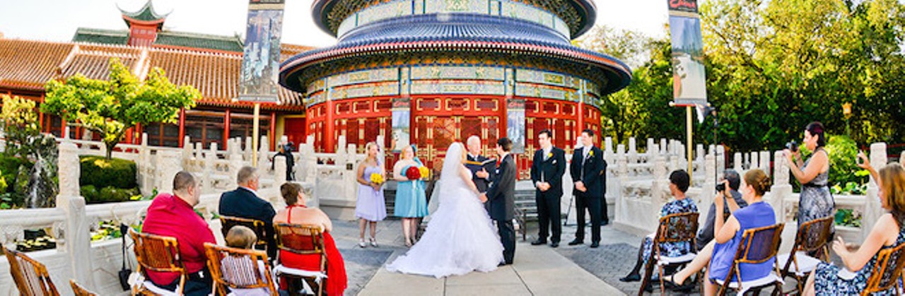 When people think about Disney weddings, they tend to think of the Magic Kingdom. But why not get married at someplace more interesting, like the China Pavilion at Epcot? Photo via Disneyweddings.com.