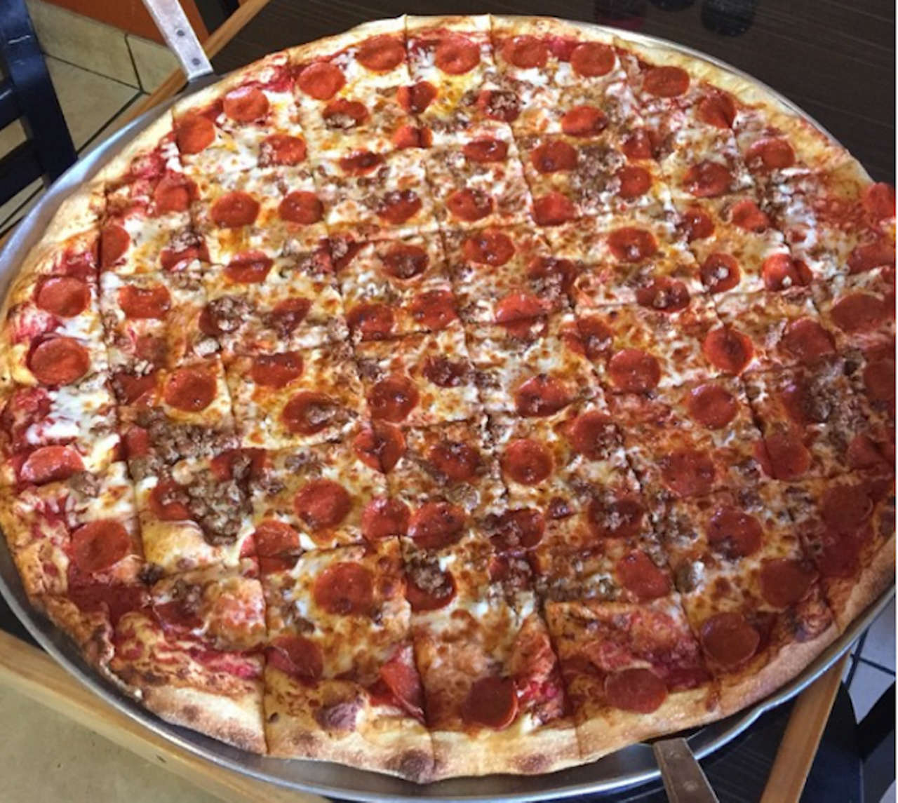 Pizza Xtreme
7250 S Kirkman Rd #103, Orlando, (407)-226-3333 
A 28-inch pizza. Two people. One Hour. No restroom breaks. Are you up to the challenge?
Photo via ckautobrokers/Instagram