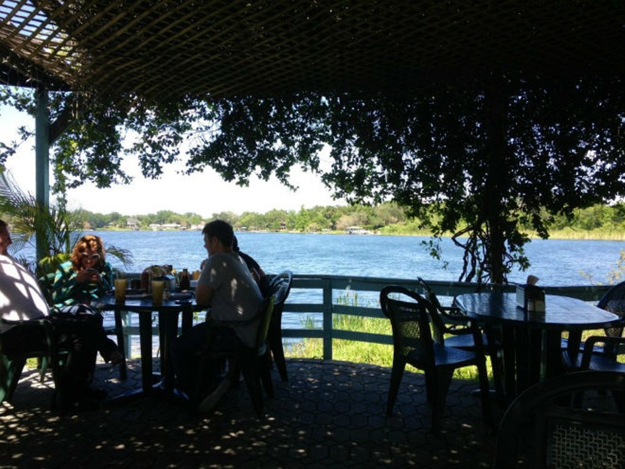 Julie's Waterfront
4201 S Orange Ave, 407-240-2557
Sipping on a gin and tonic and taking in the view of Lake Jennie Jewel on this beautiful patio cannot be beat. It's also a dog-friendly patio so bring your pooch. 
Photo by Yelp
