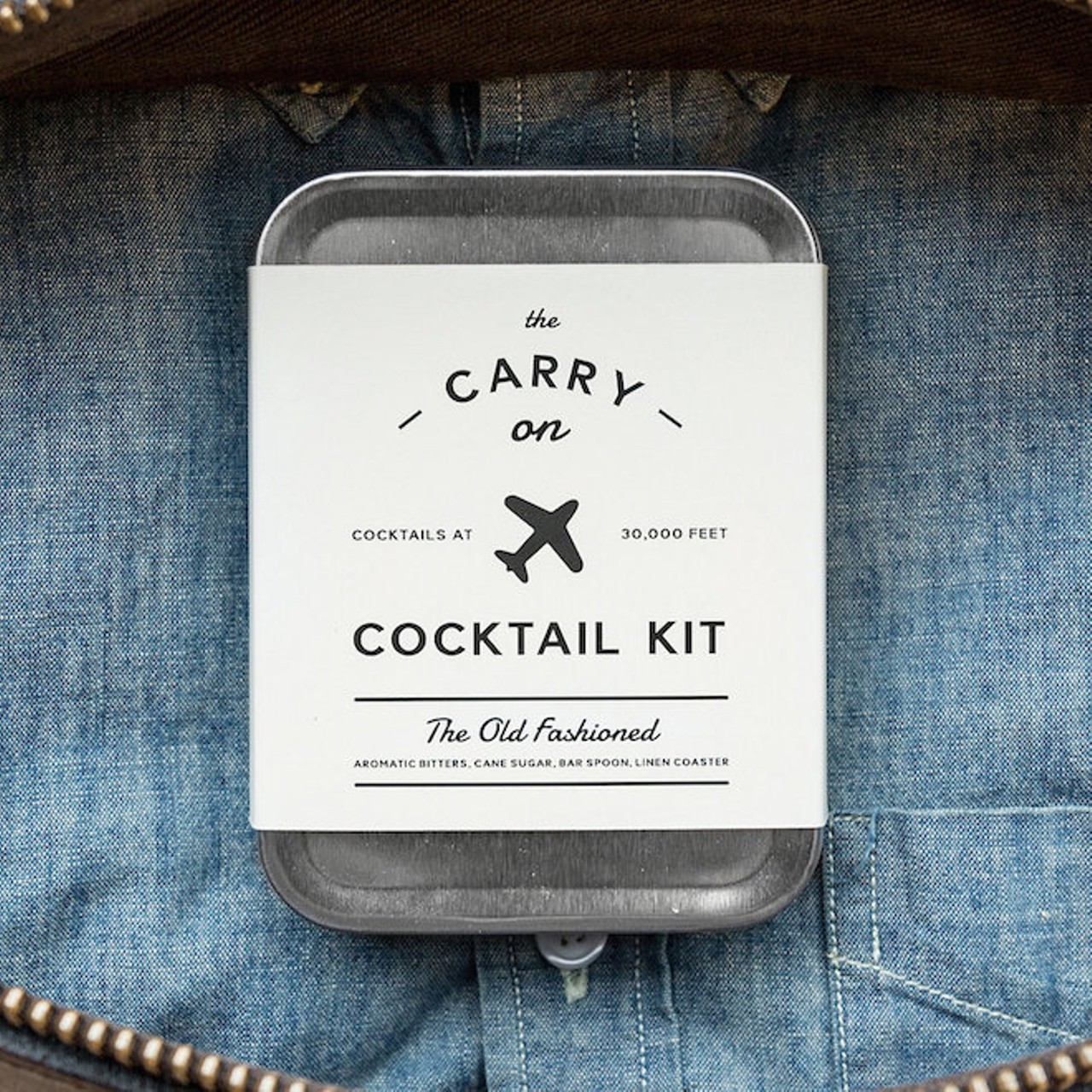 TSA restrictions on liquids carried onto planes have, among other things, doomed travelers to long stretches in the air without access to civilized drinking. Online cocktail mag Punch and W&P Design teamed up to create the Carry On Cocktail Kit to stave off that very problem &#150; the tiny tin is stocked with everything you need to mix two perfect Old Fashioneds at cruising altitude, from bitters to muddler, right down to a linen napkin. All you need do is procure a mini whiskey (or two) from the drinks cart. Bottoms way, way up! ($24, carryoncocktailkit.com)