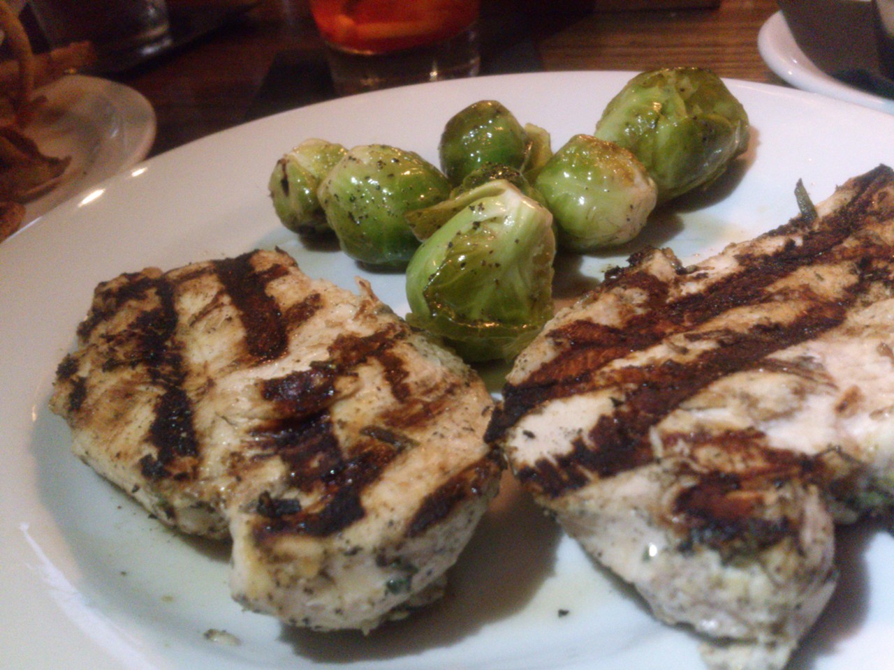 The lighter side: herb-marinated chicken and Brussels sprouts at Church Street Tavern