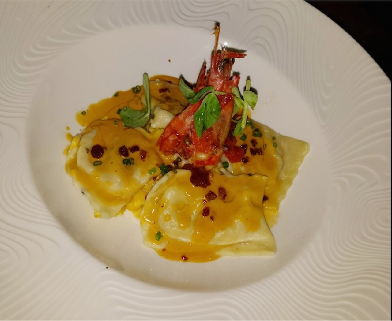 Hand-Made Canaveral "Shrimp and Grits" Ravioli
(Andouille Sausage, Tomatoes, Veloute)