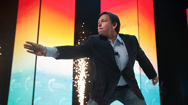 Florida governor Ron DeSantis does a little magic trick and makes his state's place in the modern world, as well as his own lips, disappear
