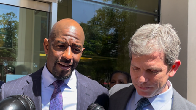 Former Democratic nominee Andrew Gillum (left) and attorney David Markus spoke after a jury acquitted Gillum on one charge and couldn't reach a verdict on other charges.