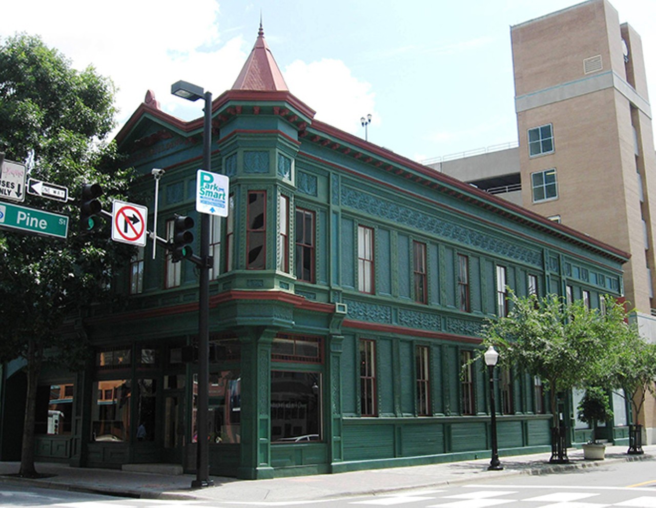 Rogers Building, OrlandoThis former gentlemen's club is named after one Gordon Rogers. He and his wife seem to have a soft spot for this building as their spirits have been haunting the second floor window and first floor art gallery.Image via thecraftsmanblog.com
