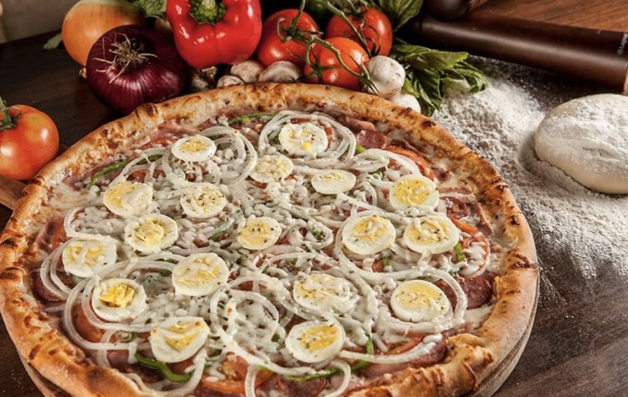The Portuguese 
Piefection, 3120 S. Kirkman Road
An egg-cellent choice if you want to try something different without too much risk. The Portuguese features ham, bacon, calabrese salami, veggies and eggs.  
Photo via Pie-fection