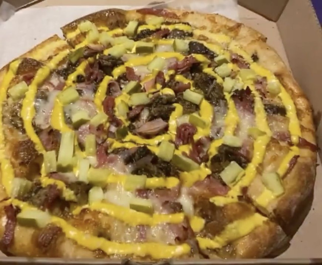 The Wild in Havana Mellow Mushroom, multiple locations Mellow Mushroom takes the concept of the Cuban Slice to another whole level Tampa-style with the Wild in Havana, a pizza topped with jerk-marinated pork, ham, salami and a mayo-mustard drizzle.
Photo via Mellow Mushroom/Instagram