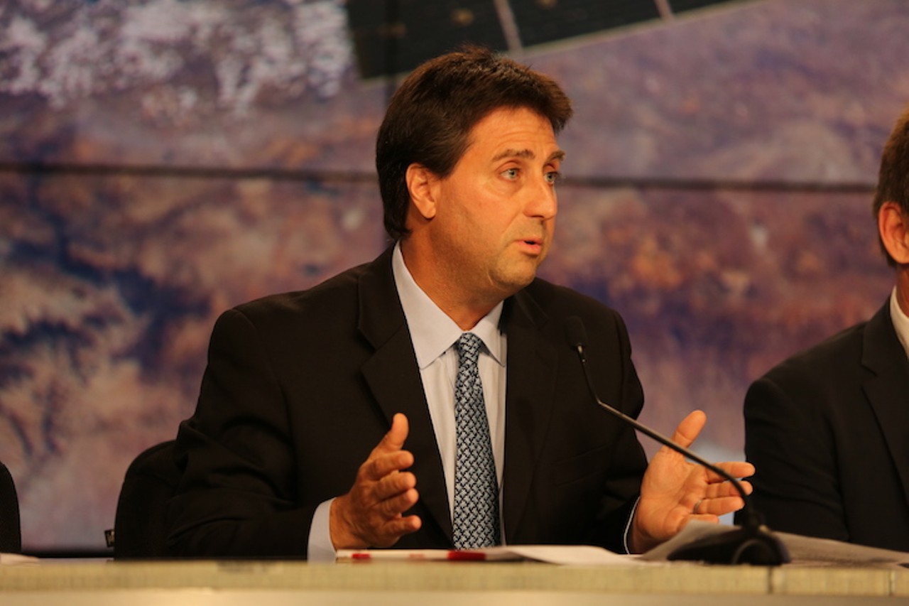 Joel Montalbano, ISS deputy program manager for Utilization, NASA&#146;s Johnson Space Center, gives a prelaunch status briefing at 2:29pm. Heightened press evacuation measures and limited media sites "due to Dragon Abort scenario" &shy;said Montalbano. NASA&#146;s spontaneous decision to close down the Vehicle Assembly Building to the media during the launch was a contentious issue for reporters. When asked about press site closure and alleged safety precautions, Montalbano said it was in response to a possible &#147;Dragon Abort Scenario,&#148; but refused to comment on what the Dragon Abort Scenario means.