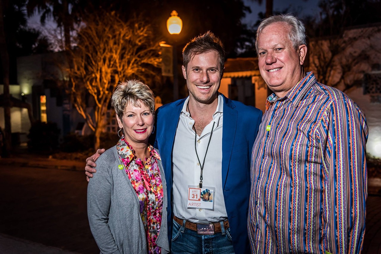 Maitland Tire Co. owners Kelley & Rob Lesperence (Sponsor of Culture Pop!) with artist Jason Hackenwerth