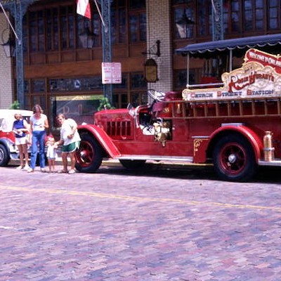 Rosie O'Grady's fire truck tour bus at Church Street Station in Orlando, likely after 1972.