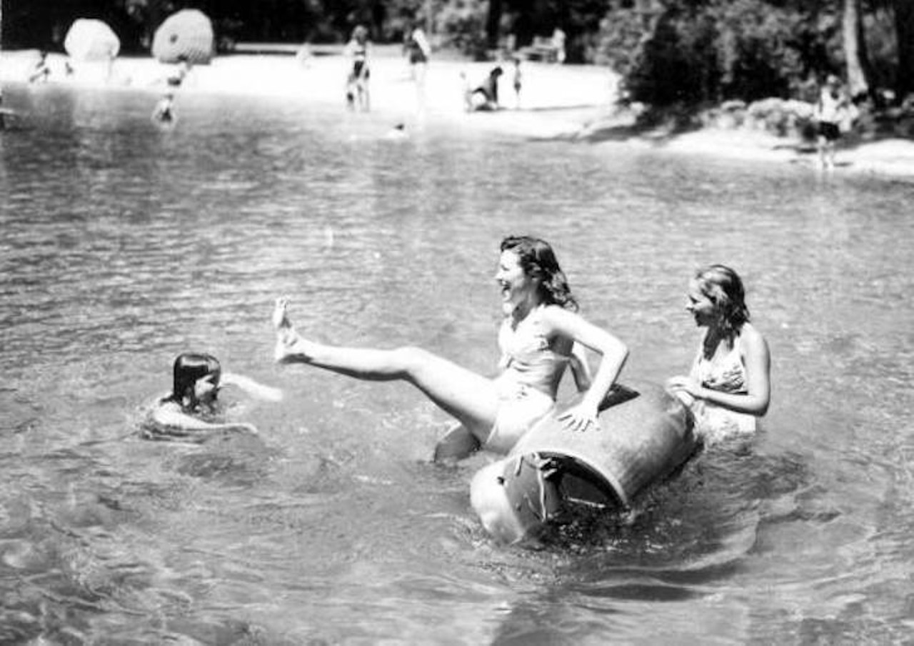 Visitors play in the springs, 1946.