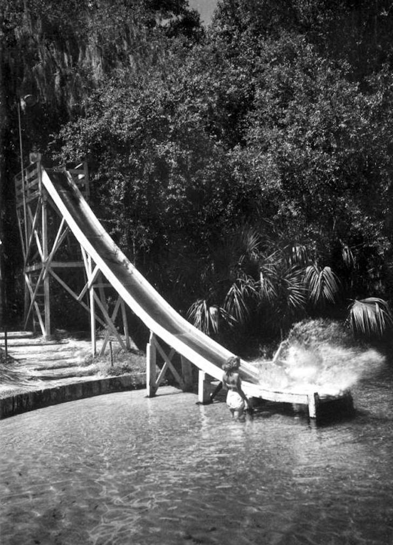Visitors use the water slide - Sanlando Springs, 1946.