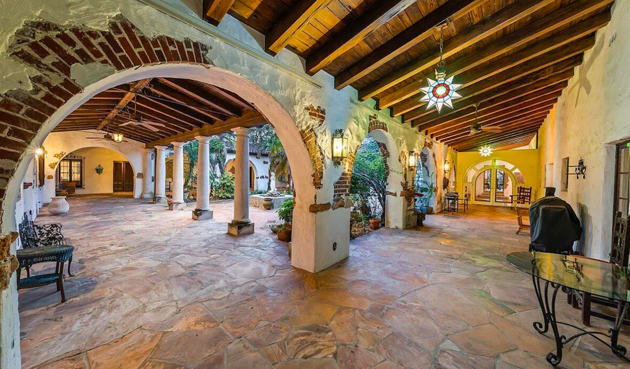 Spanish resort-style 'Hacienda del Sol,' with art studio, 50,000-gallon pool and guest cottage, is for sale just outside of Orlando
