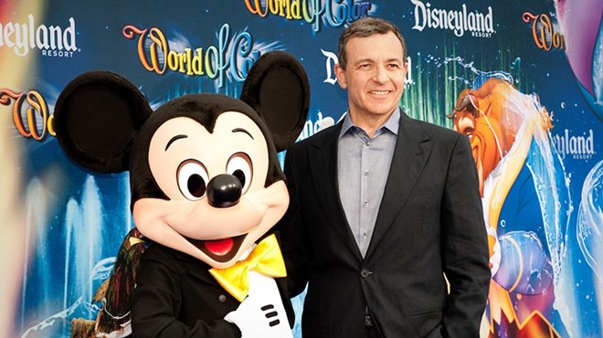Mickey Mouse and Bob Iger on the red carpet. Iger stepped down as Disney CEO in February.