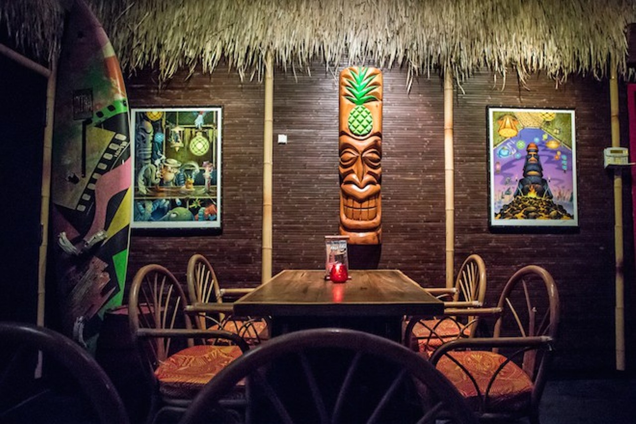 Aku Aku Tiki Bar
431 E. Central Blvd.; 407-839-0080
It's a dark, intimate lounge ripe for a takeover &#150; a group of a dozen could own the place. Comfy 1950s rattan furniture, a giant tiki idol, leaning surfboards, and hanging blowfish and glass floats set the scene for sweet-but-not-too Zombies, Singapore slings and Volcano bowls. Try (not to fall over after finishing) the Tigerfucker, built from 44 North huckleberry vodka and house-made blackberry-jalape&ntilde;o syrup, topped with a flaming sugar cube and served in a huge glass goblet.
Photo by Rob Bartlett