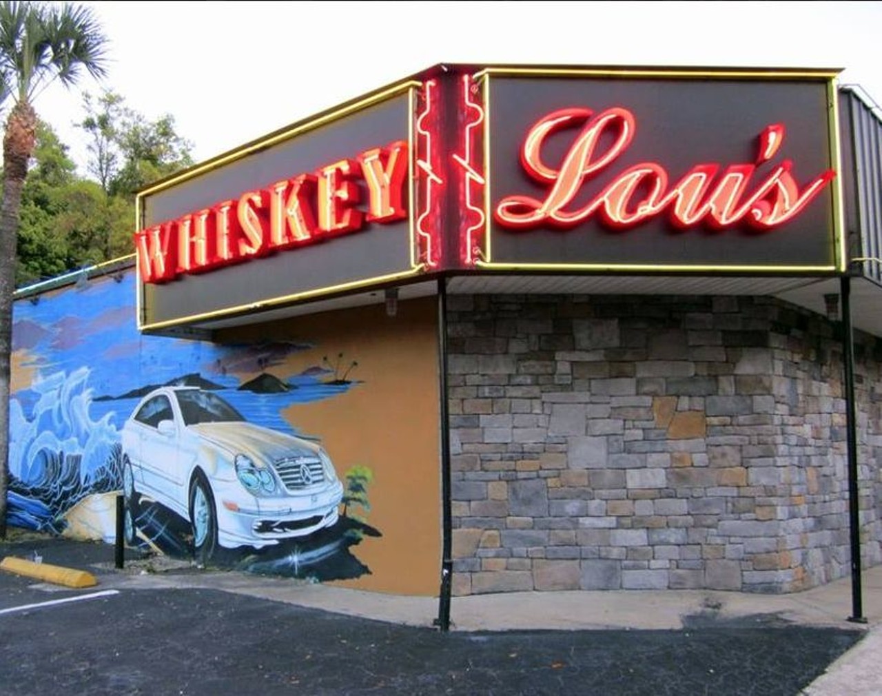 Whiskey Lou&#146;s Lounge 
121 N. Bumby Ave., 407-896-2593 
An Orlando Classic, visit Whiskey Lou&#146;s Lounge for the dive-bar experience complete with a jukebox, pool table, and strong drinks starting at 9 a.m. 
Photo via Whiskey Lou&#146;s Lounge/ Facebook