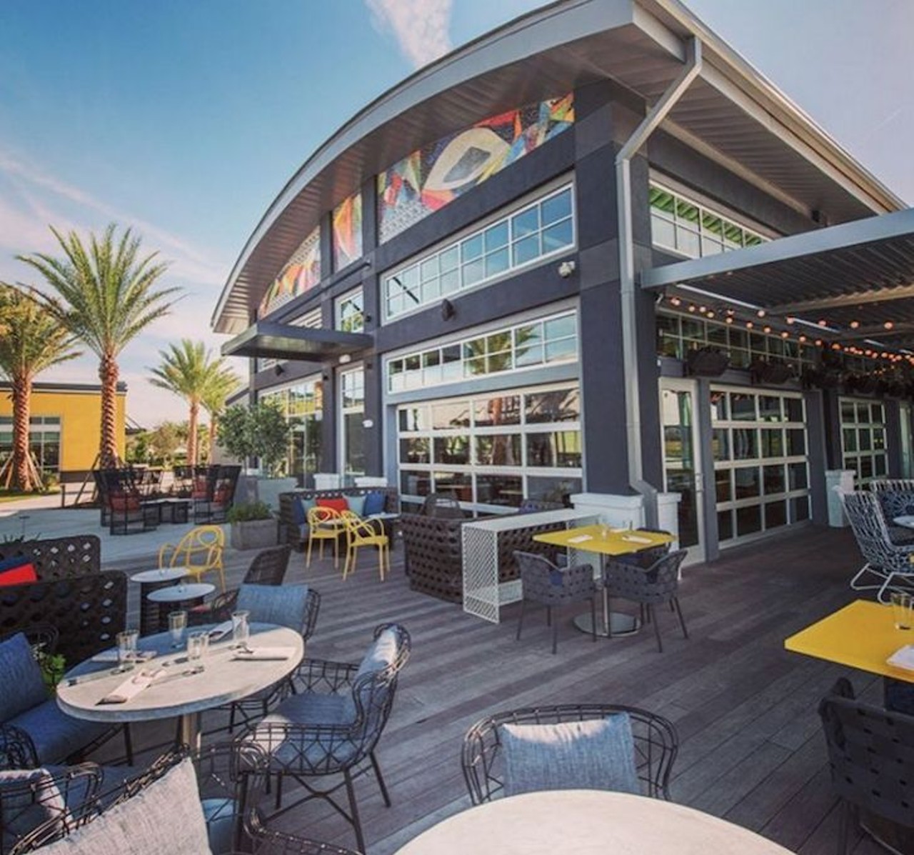 Canvas
13615 Sachs Ave., 407-313-7800
This indoor-outdoor restaurant on Lake Nona combines Southern-style food with a Latin accent. The expansive lake views and various colorful couches make this spot one of Orlando&#146;s best when it comes to outdoor brunch. 
Photo via canvas/Instagram
