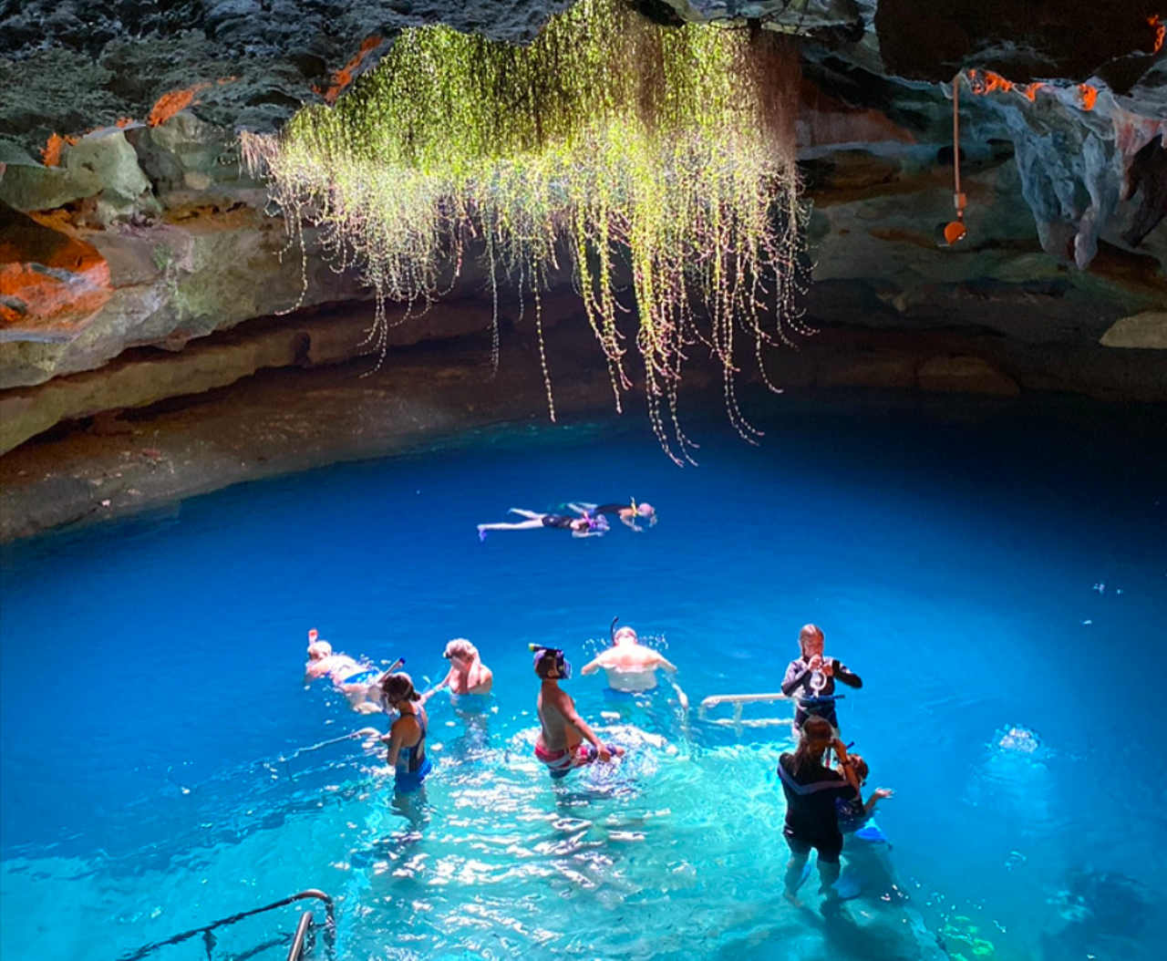 Devil’s Den
2 hours from Orlando
This Instagram-worthy North Central Florida spring gets its name from the steam (fiery smoke?) that was seen radiating off the water when it was first discovered. Now you can swim, scuba dive or snorkel in this prehistoric watery cave.