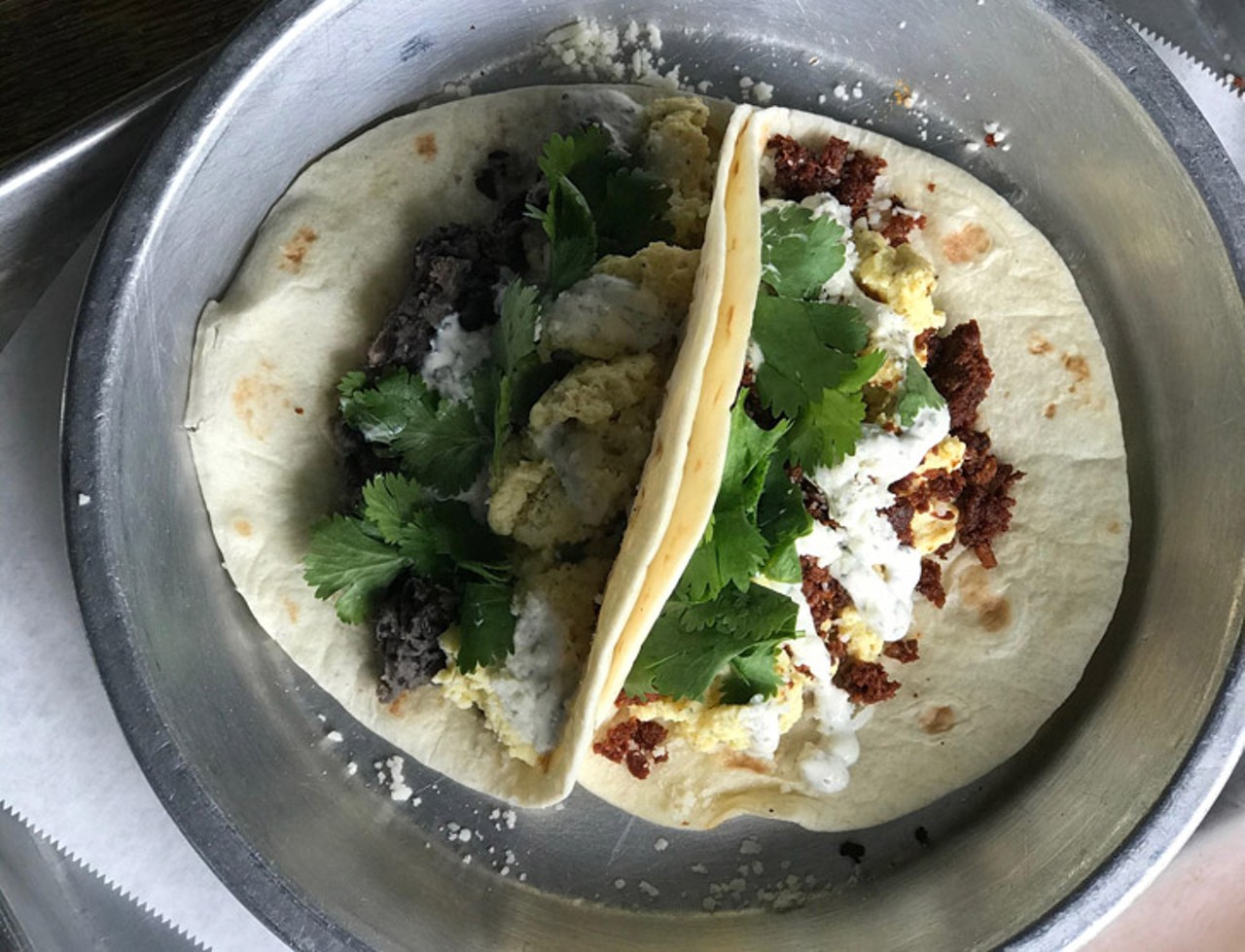 Se7en Bites   
617 Primrose Drive, 32803, 407-203-0727
Two of Either Breakfast Taco:
Black refried beans, egg, and cheese taco
Chorizo, egg, and cheese taco
Photo via Se7en Bites