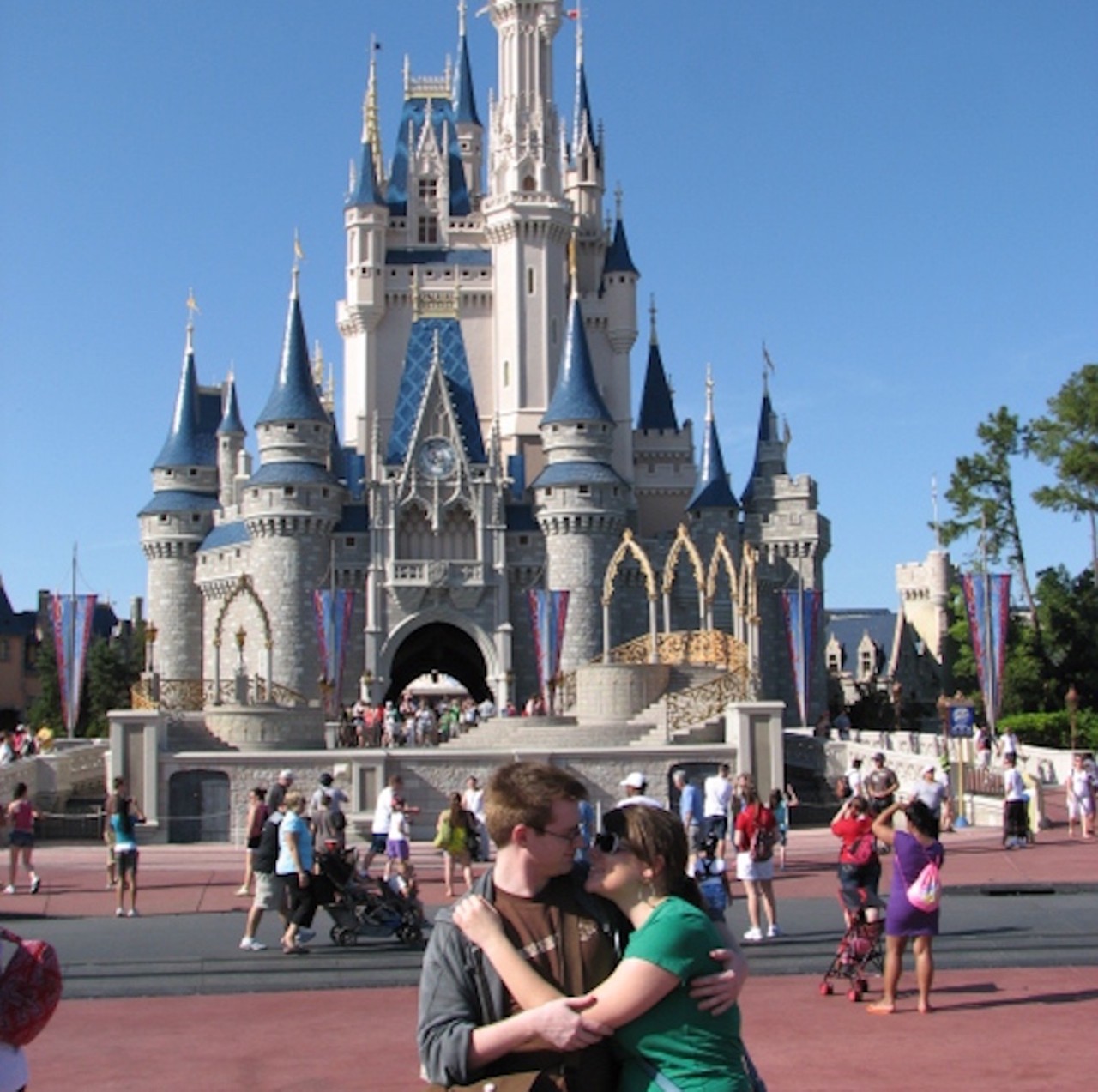 11. Cinderella's Castle
If you're both in love with a mouse, there's no better place to lay on a smooch.
Photo via Dan Catchpole/Flickr