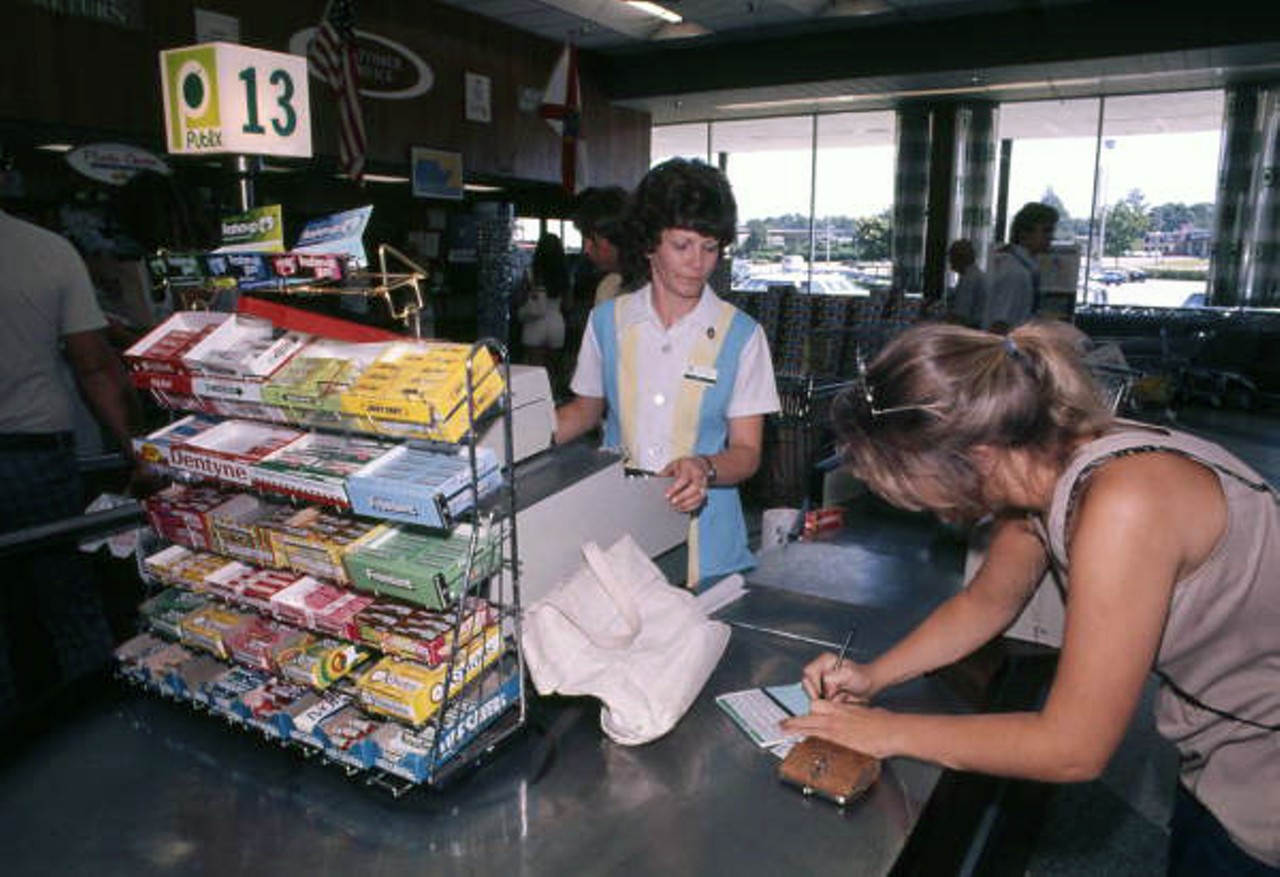 Customer at the checkout counter in a Publix supermarket in Tallahassee, date unknown.
