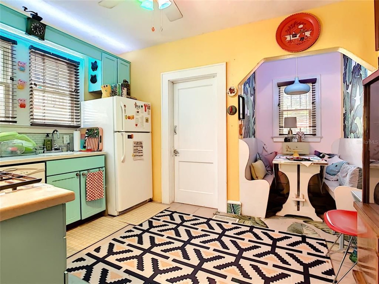 This colorful bungalow in Lake Eola Heights comes with a zany kitchen and it just hit the market