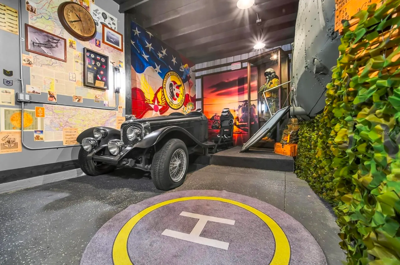 This Orlando-area home comes with a real retired military helicopter inside of it