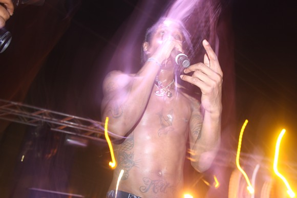 Travi$ Scott - Photos by Luis Vazquez and Larry Andresol