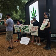 Protesters gather in downtown Orlando demanding Rick Scott take action on medical marijuana