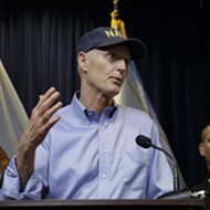 Group spends $4 million on television ad ripping on Rick Scott's Navy hat