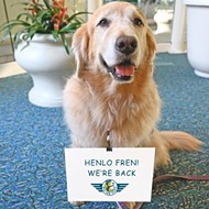 Orlando International Airport restarts "Paw Pilots" program, bringing therapy dogs back from pandemic hiatus
