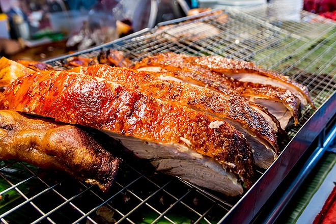 Sea Dog Brewing celebrates the big pigskin game with an actual roast pig