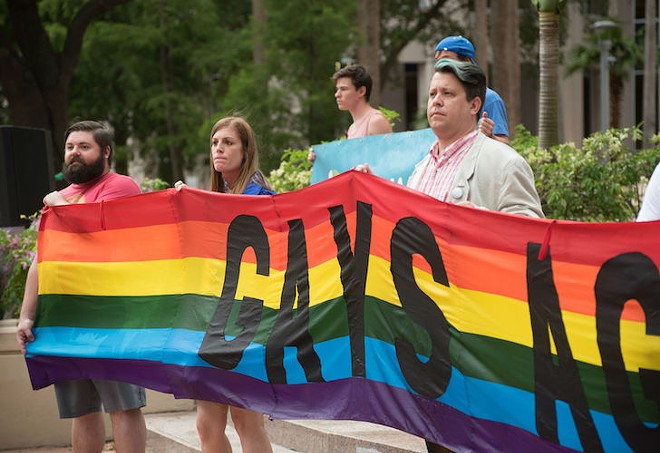 Pulse survivors honor 49 victims at Orlando rally demanding gun reform, LGBTQ rights (2)