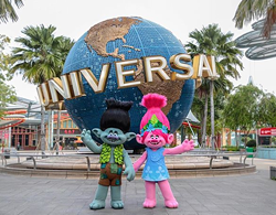 Trolls out front of the Universal Studios Singapore promoting the new summer Troll events at the park - Image via thaibookingholiday | Instagram