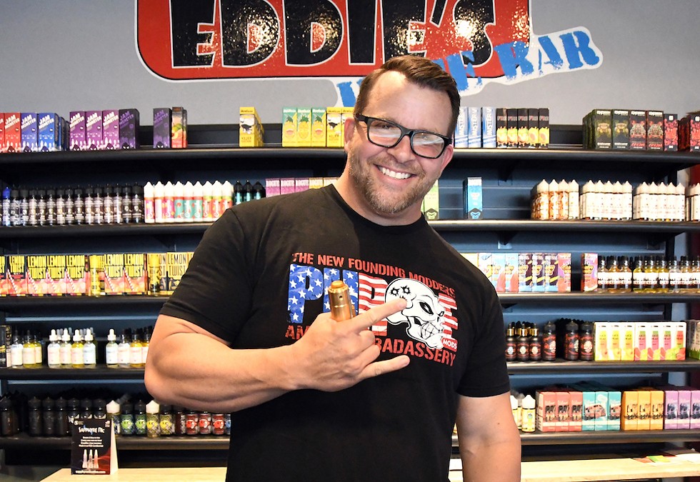 Matt Kleizo holds one of his mods - at his store, Fast Eddie’s - Photo by Jen Cray