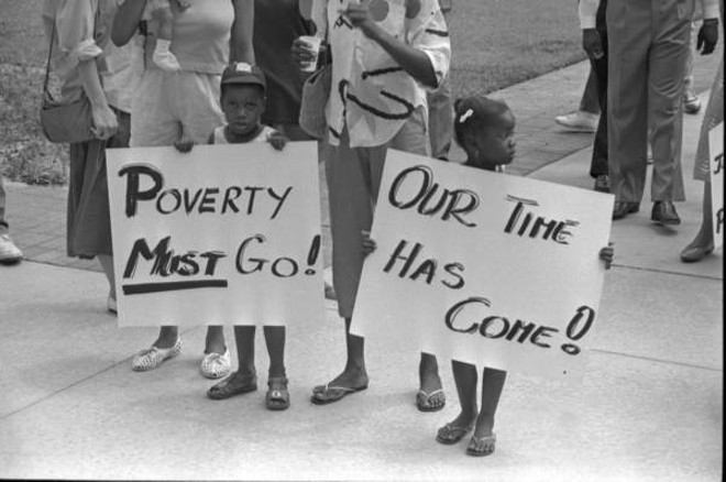 Two children protest poverty in Tallahassee in 1987. - Photo by Deborah Thomas via Florida State Archive
