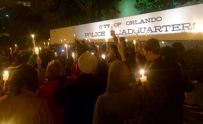 Activists and community members gathered to #ReclaimMLK during Black Lives Matter vigil in downtown Orlando