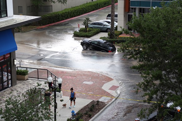Watch out for this giant puddle that nearly swallowed an SUV in downtown Orlando