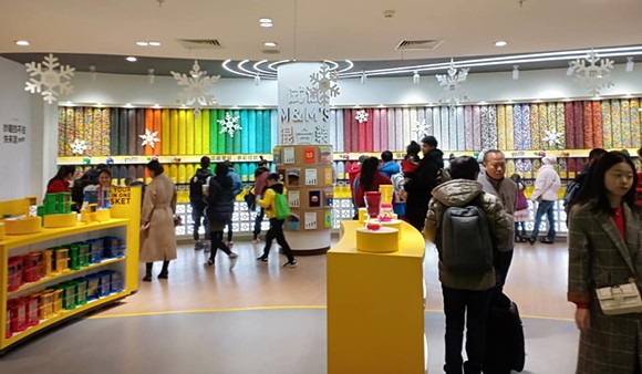 A look at the sleek design of the new M&M World concept in Shanghai - Image via Kelly Hii/Facebook