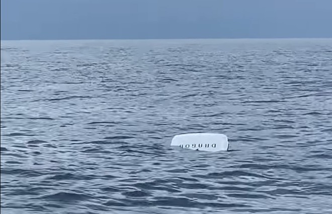 Fisherman catches door of SpaceX capsule off Daytona Beach